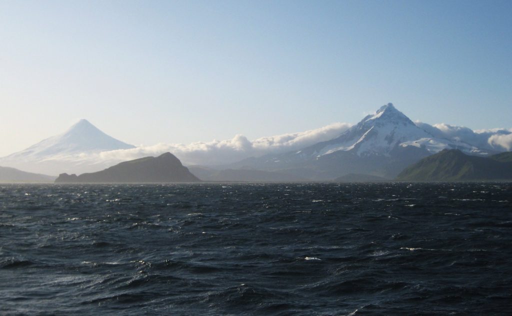 Shishaldin (left) and Isanotski volcanoes on Unimak Island. Alaska, Aleutian Islands, Unimak Island.