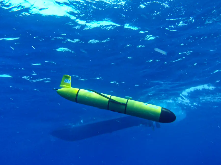 Picture of a Teledyne Webb Research Slocum glider equipped with a hydrophone to record ocean sound.